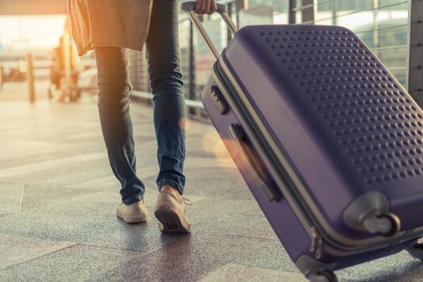 Person pulling luggage