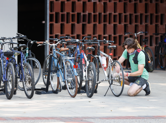 Biker locking up Bike